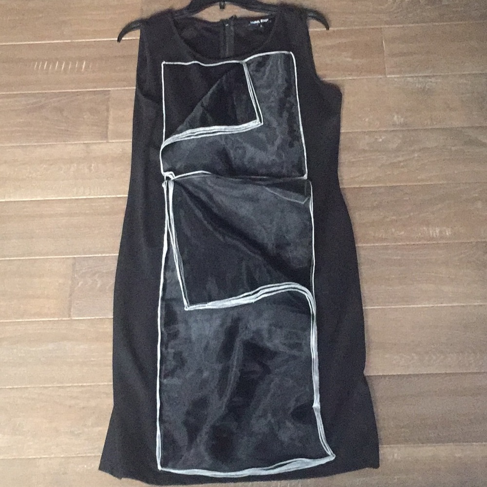 A straight, modern design, black dress